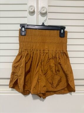 FP Movement by Free People High-Waist Smocked Shorts in Rust